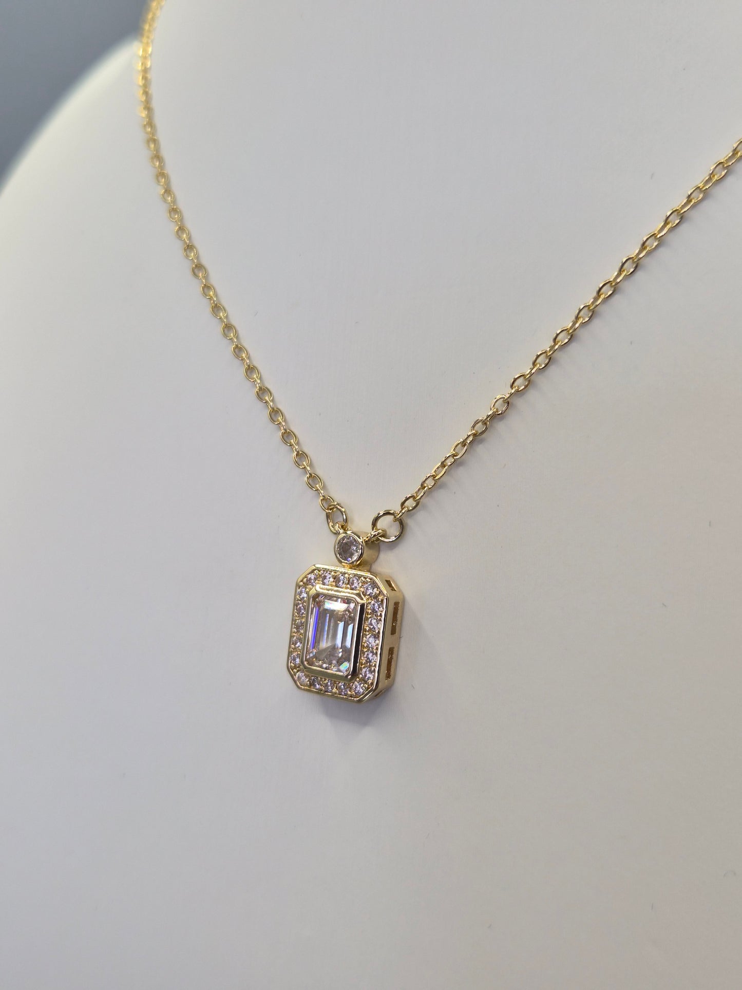 Emerald Cut Centre Stone & Round Brilliant Cut Cubic Zirconia Pendant - Yellow