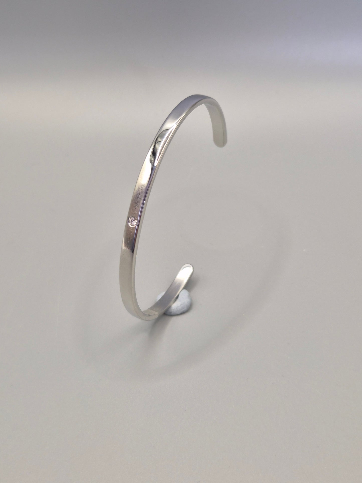 Torque Bangle Flush Set With Single Cubic Zirconia Silver Coloured