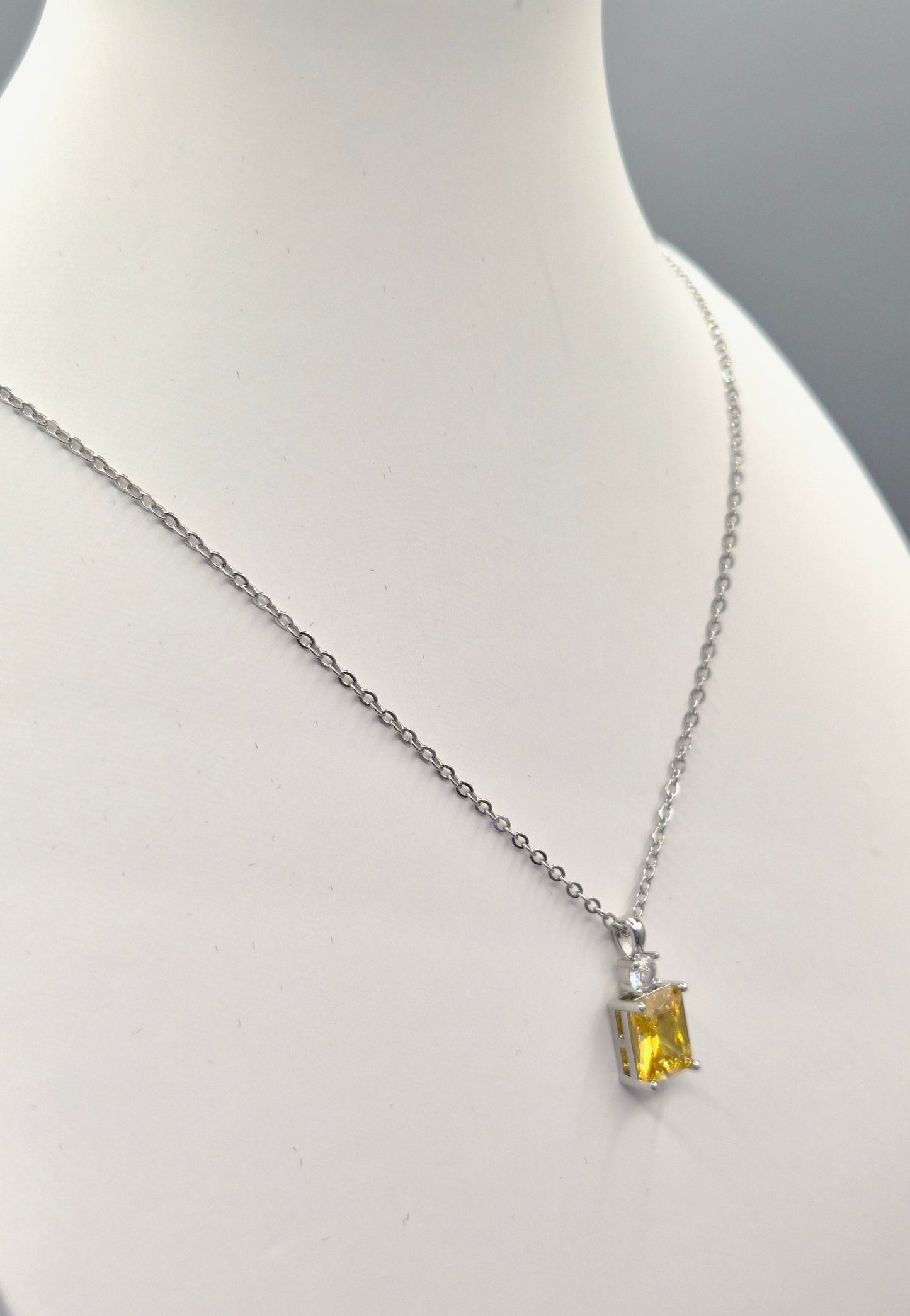 Yellow Emerald Cut Centre Stone & Cubic Zirconia Pendant