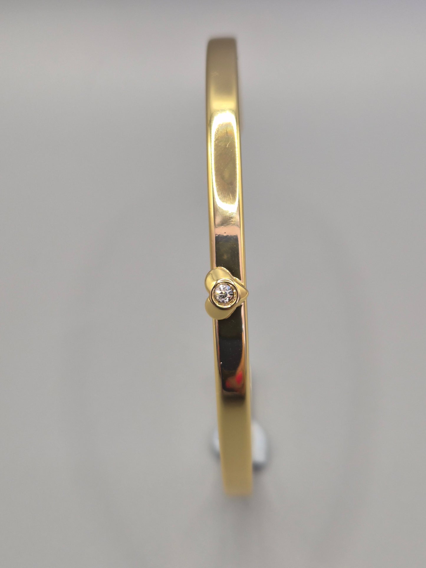 Torque Bangle With Heart Design Set With Cubic Zirconia Yellow Set