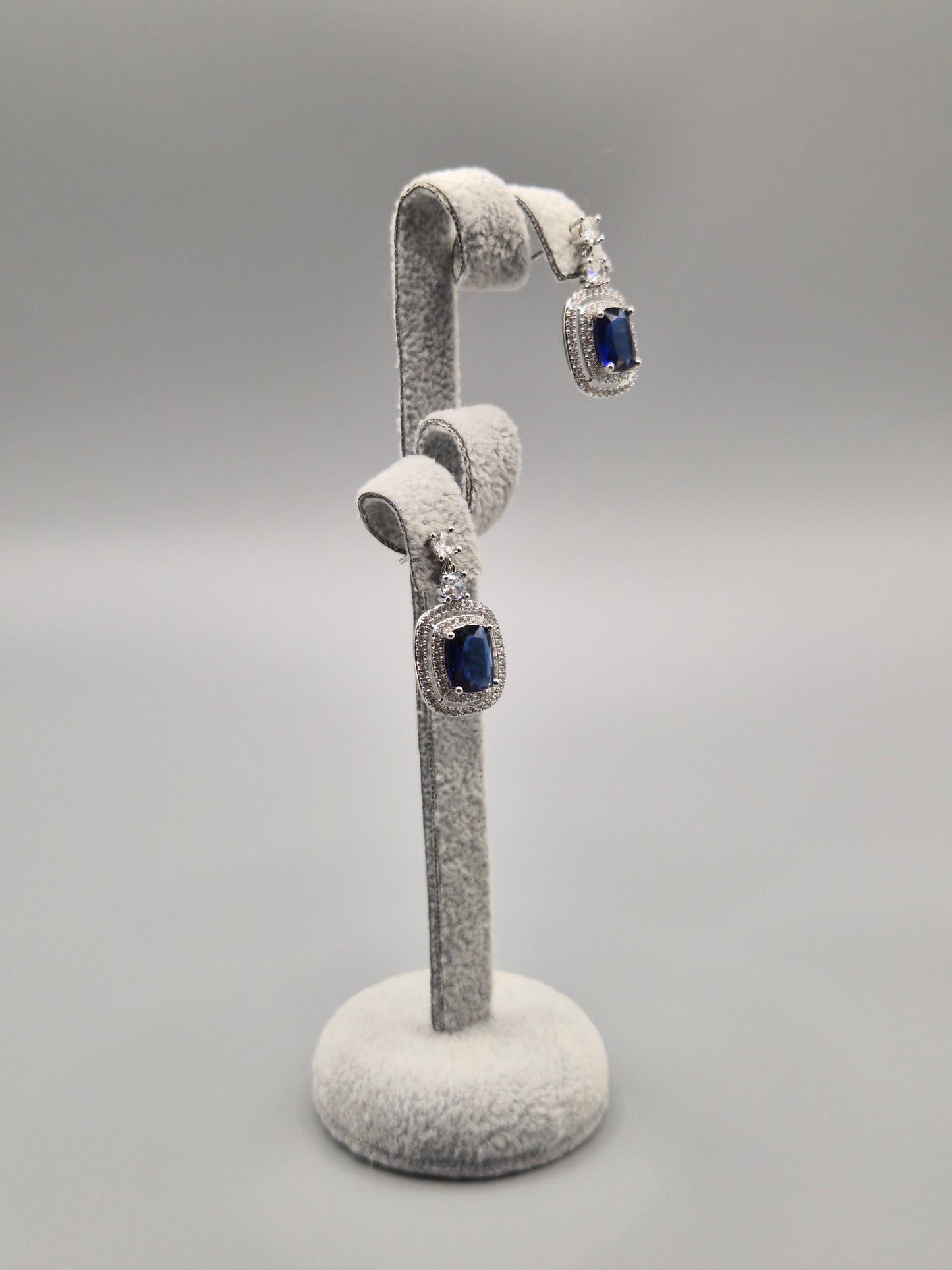 Blue Cushion Shaped Stone Surrounded by Cubic Zirconia Halo Drop Earrings