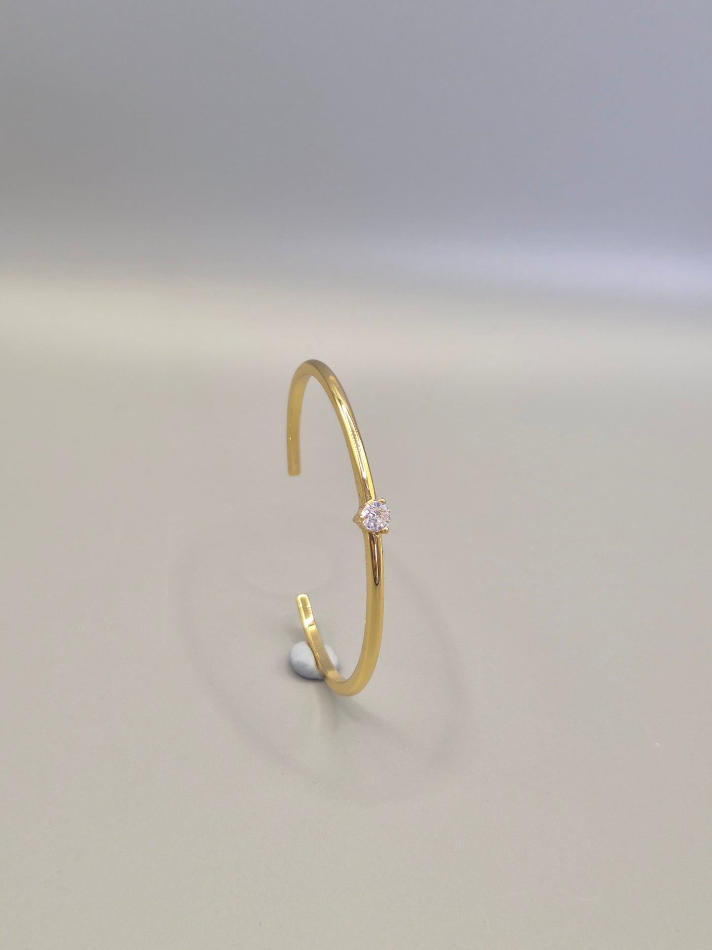 Torque Bangle Claw Set With Single Cubic Zirconia Yellow Coloured