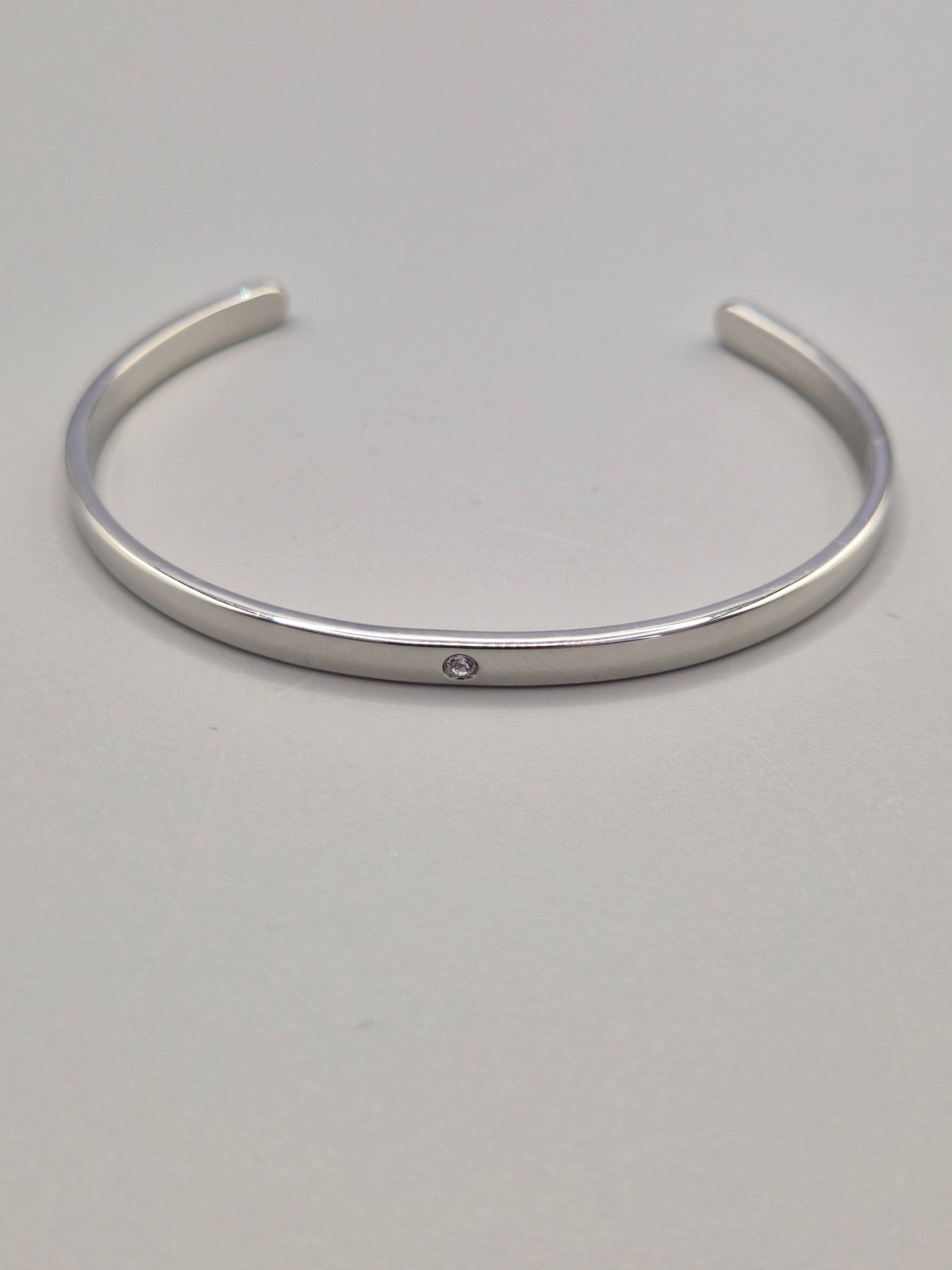 Torque Bangle Flush Set With Single Cubic Zirconia Silver Coloured