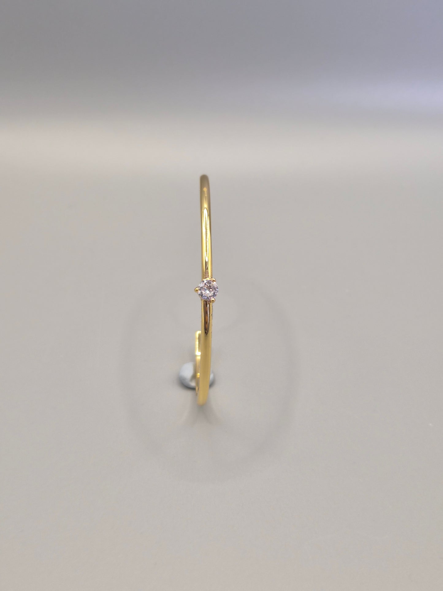 Torque Bangle Claw Set With Single Cubic Zirconia Yellow Coloured
