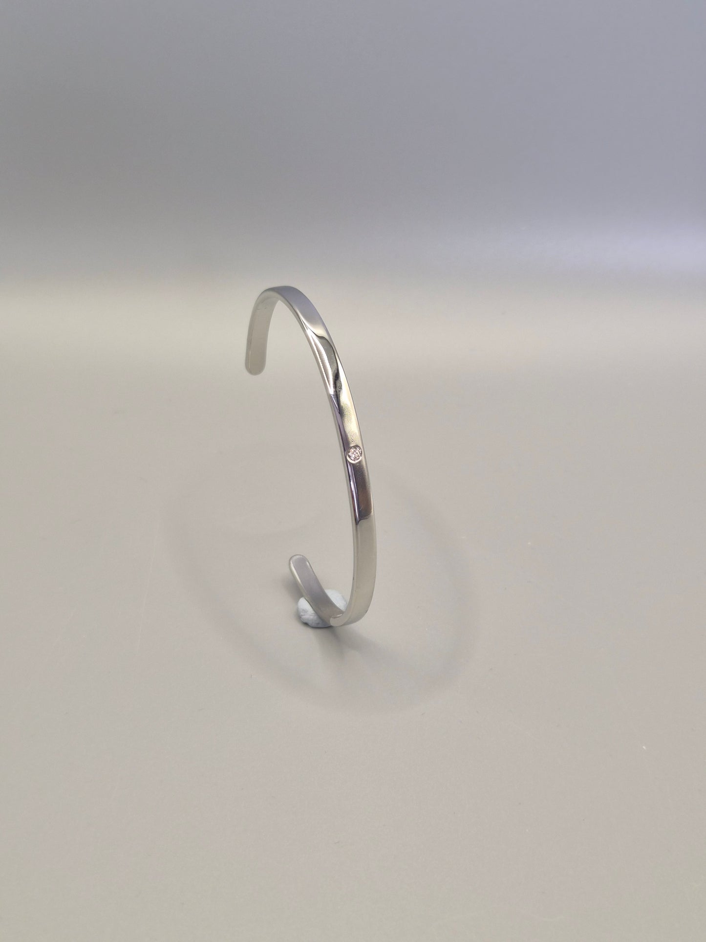 Torque Bangle Flush Set With Single Cubic Zirconia Silver Coloured
