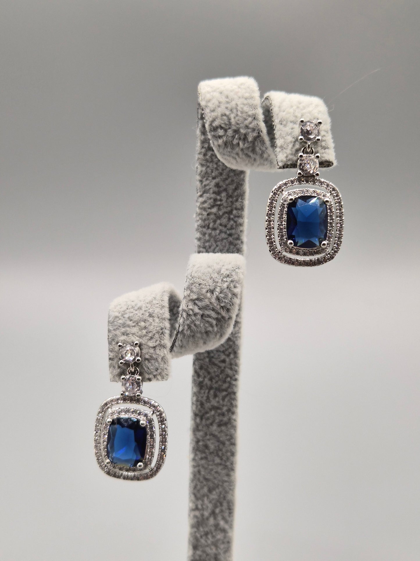 Blue Cushion Shaped Stone Surrounded by Cubic Zirconia Halo Drop Earrings