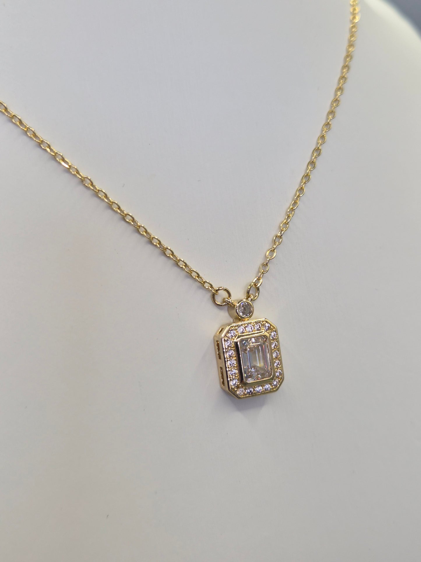 Emerald Cut Centre Stone & Round Brilliant Cut Cubic Zirconia Pendant - Yellow
