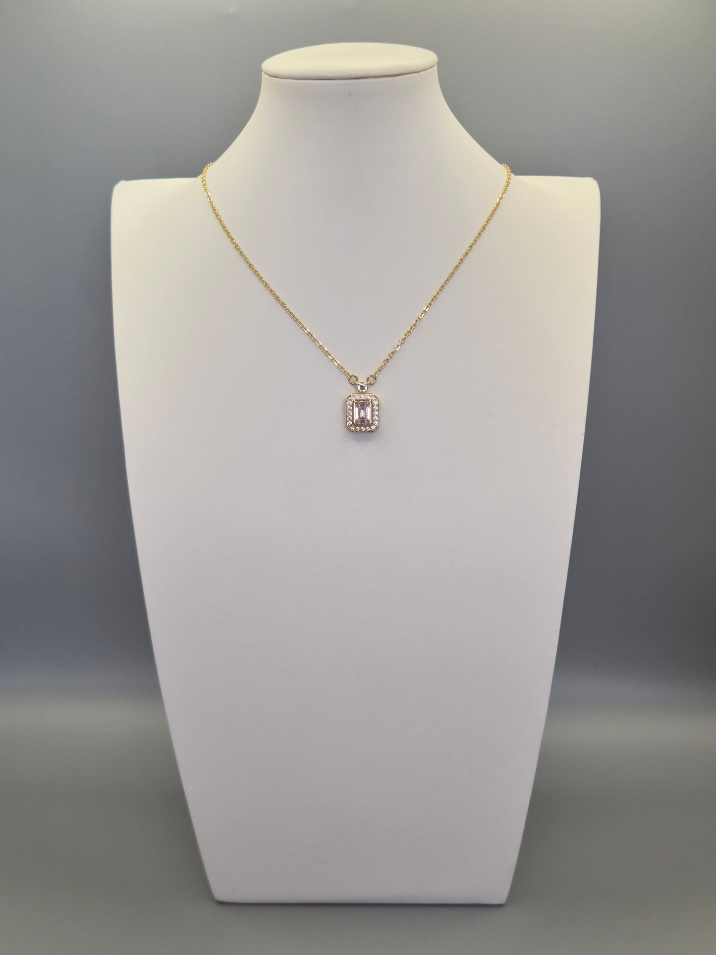 Emerald Cut Centre Stone & Round Brilliant Cut Cubic Zirconia Pendant - Yellow