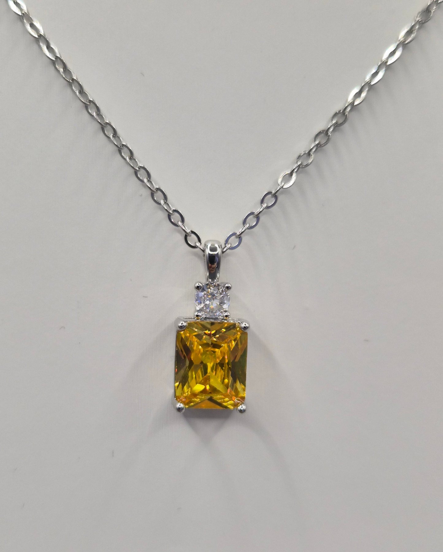 Yellow Emerald Cut Centre Stone & Cubic Zirconia Pendant