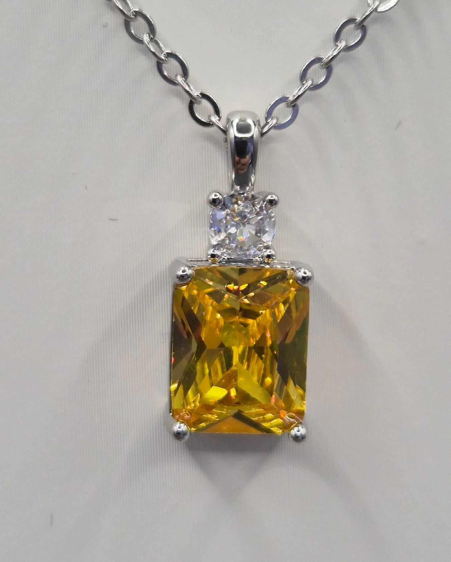 Yellow Emerald Cut Centre Stone & Cubic Zirconia Pendant