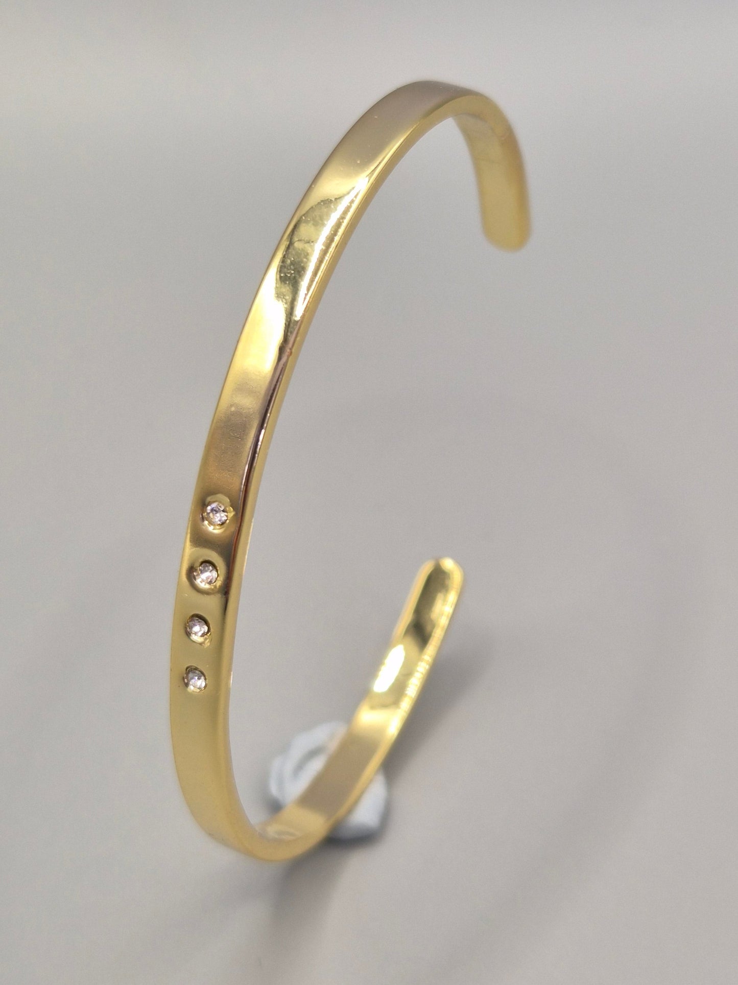 Torque Bangle With 4 Flush Set Cubic Zirconias - Yellow