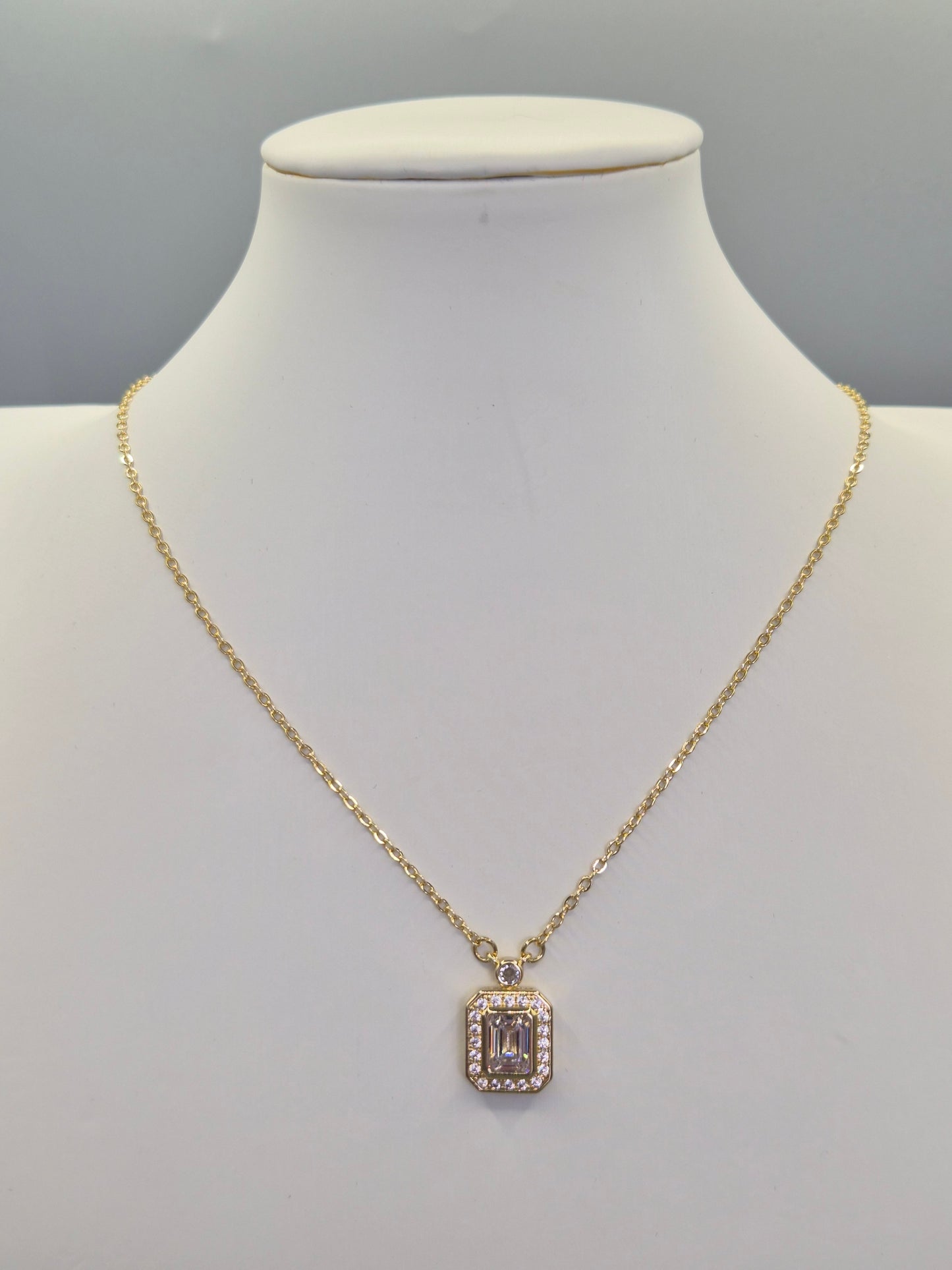 Emerald Cut Centre Stone & Round Brilliant Cut Cubic Zirconia Pendant - Yellow