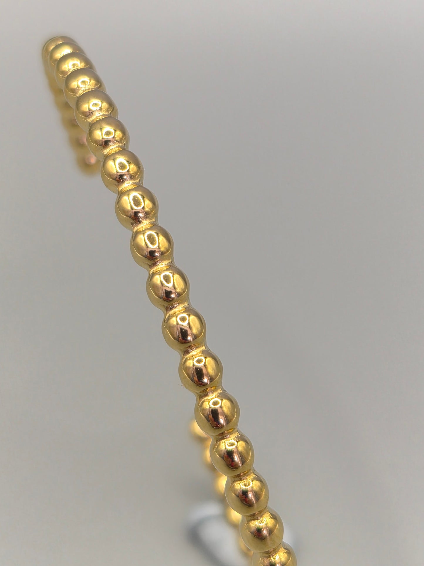 Torque Bangle Ball Design Yellow Coloured