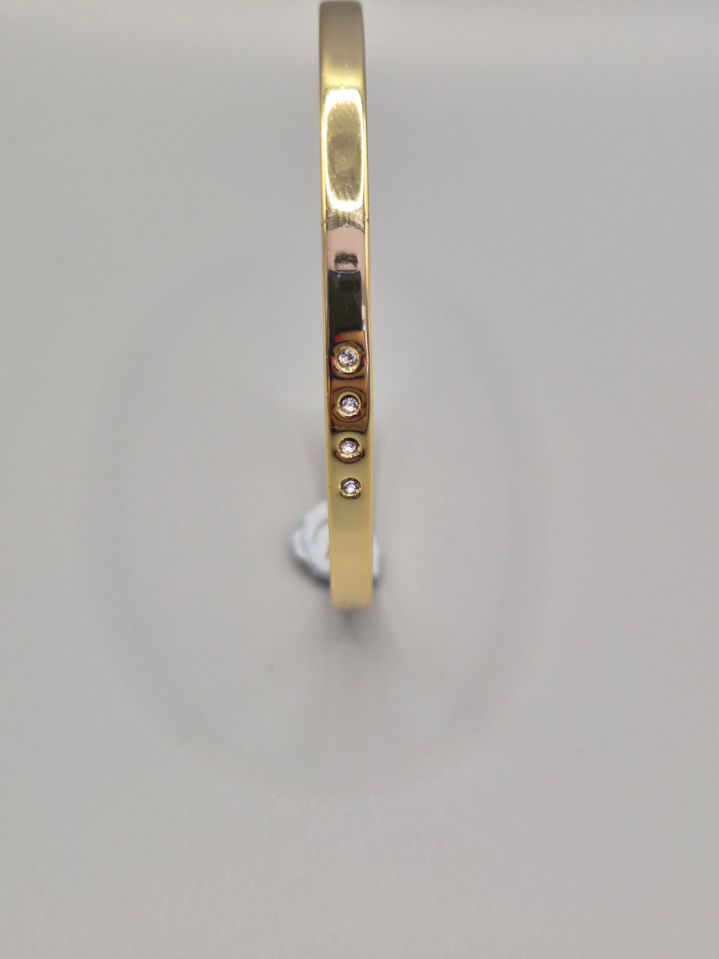 Torque Bangle With 4 Flush Set Cubic Zirconias - Yellow