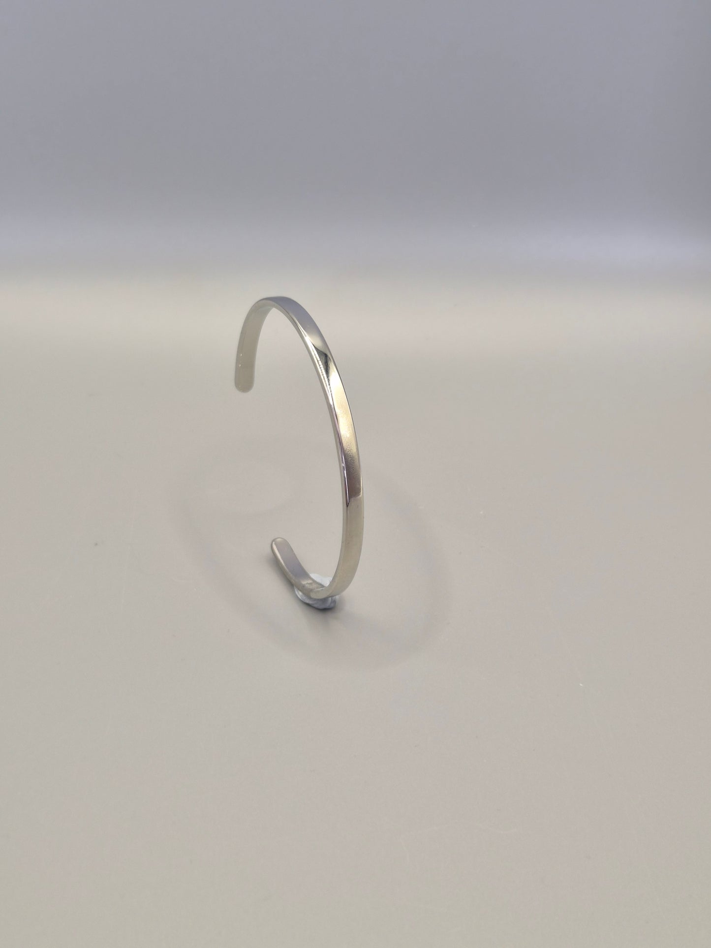 Torque Bangle Silver Coloured