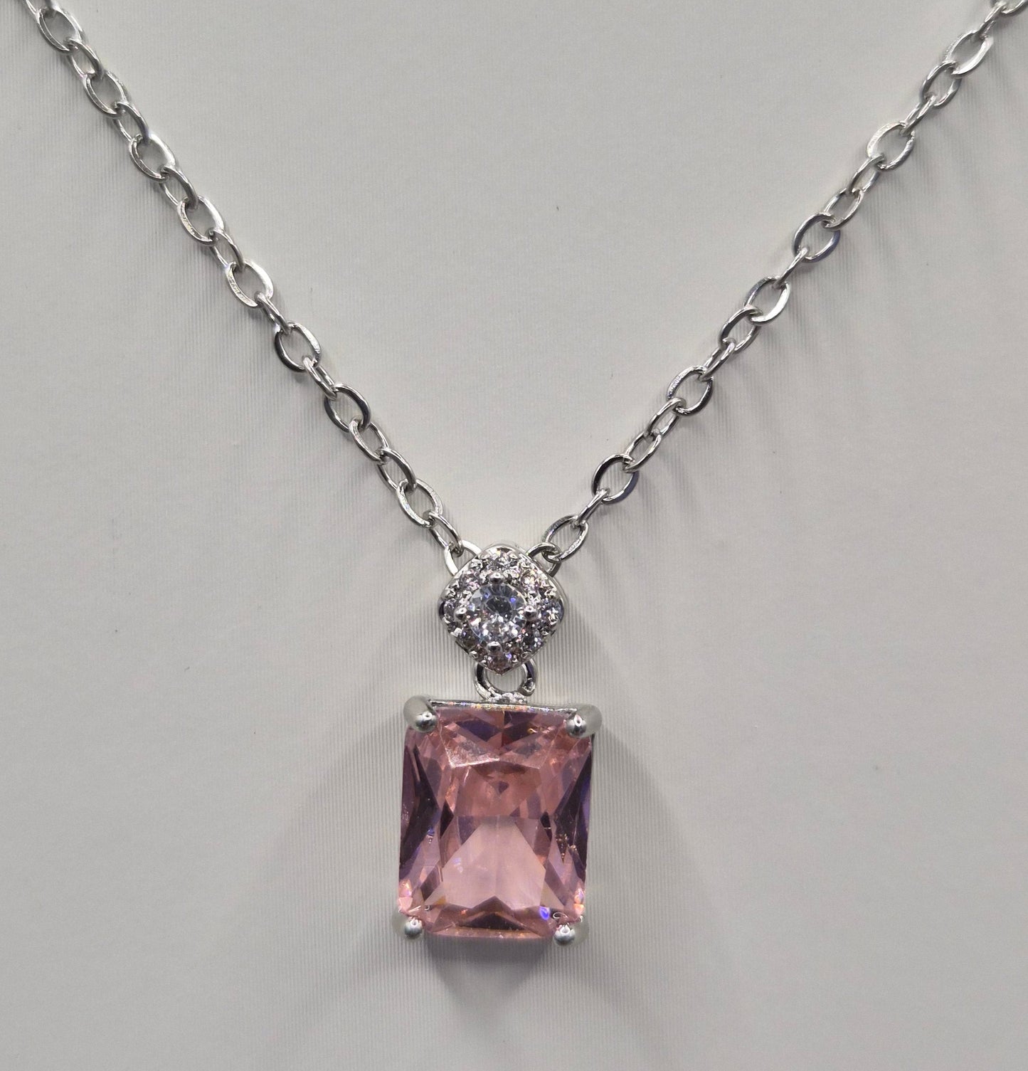 Pink Emerald Cut Centre Stone & Cubic Zirconia Pendant