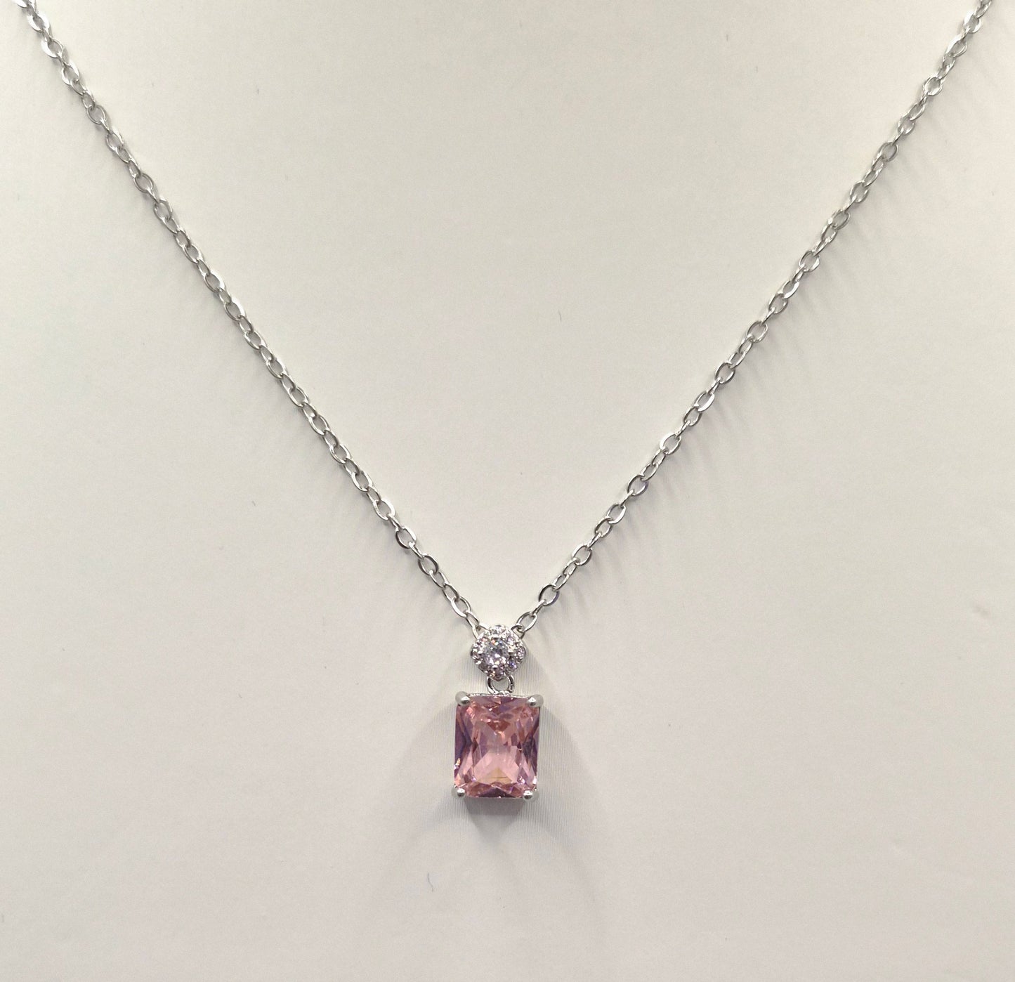Pink Emerald Cut Centre Stone & Cubic Zirconia Pendant