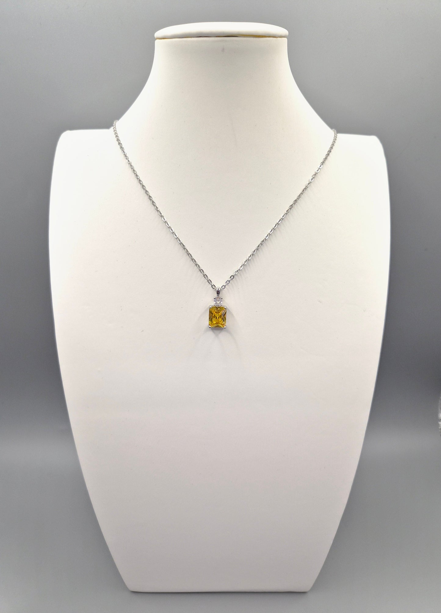 Yellow Emerald Cut Centre Stone & Cubic Zirconia Pendant