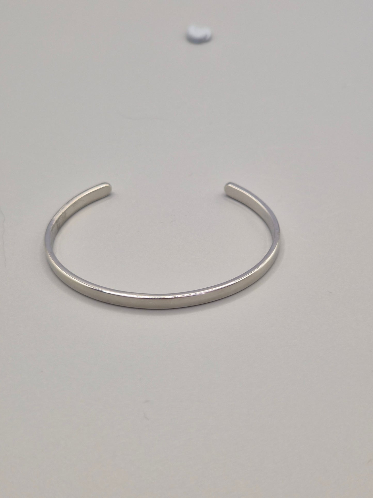 Torque Bangle Silver Coloured