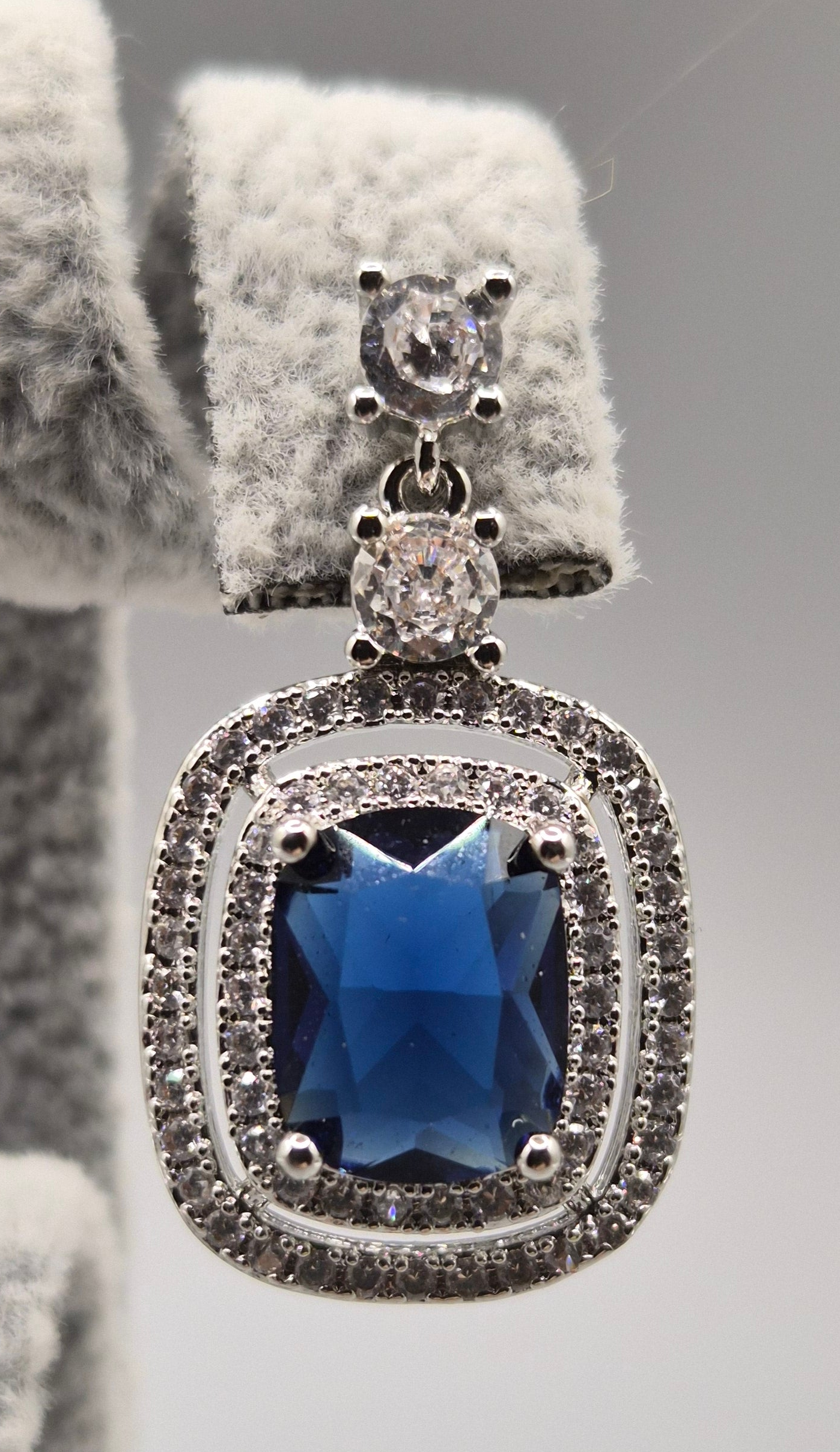 Blue Cushion Shaped Stone Surrounded by Cubic Zirconia Halo Drop Earrings