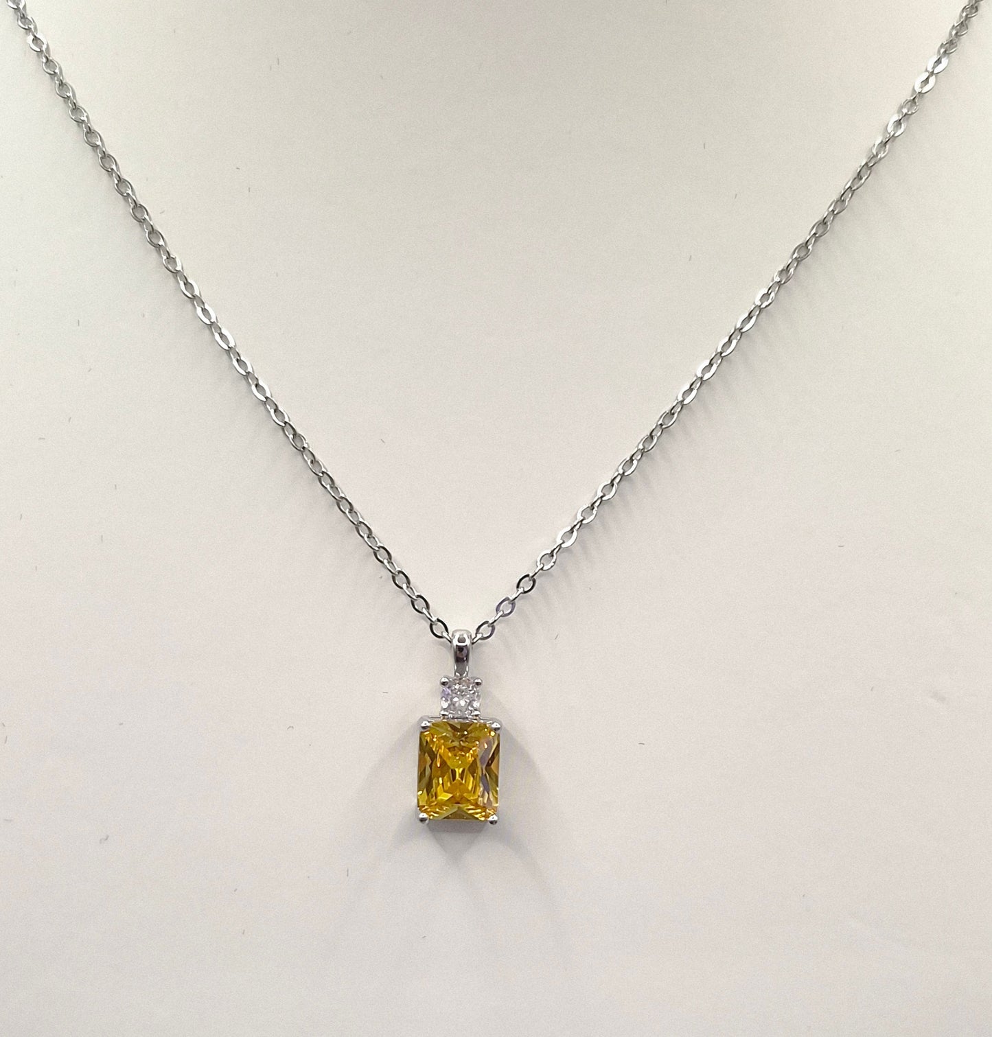 Yellow Emerald Cut Centre Stone & Cubic Zirconia Pendant