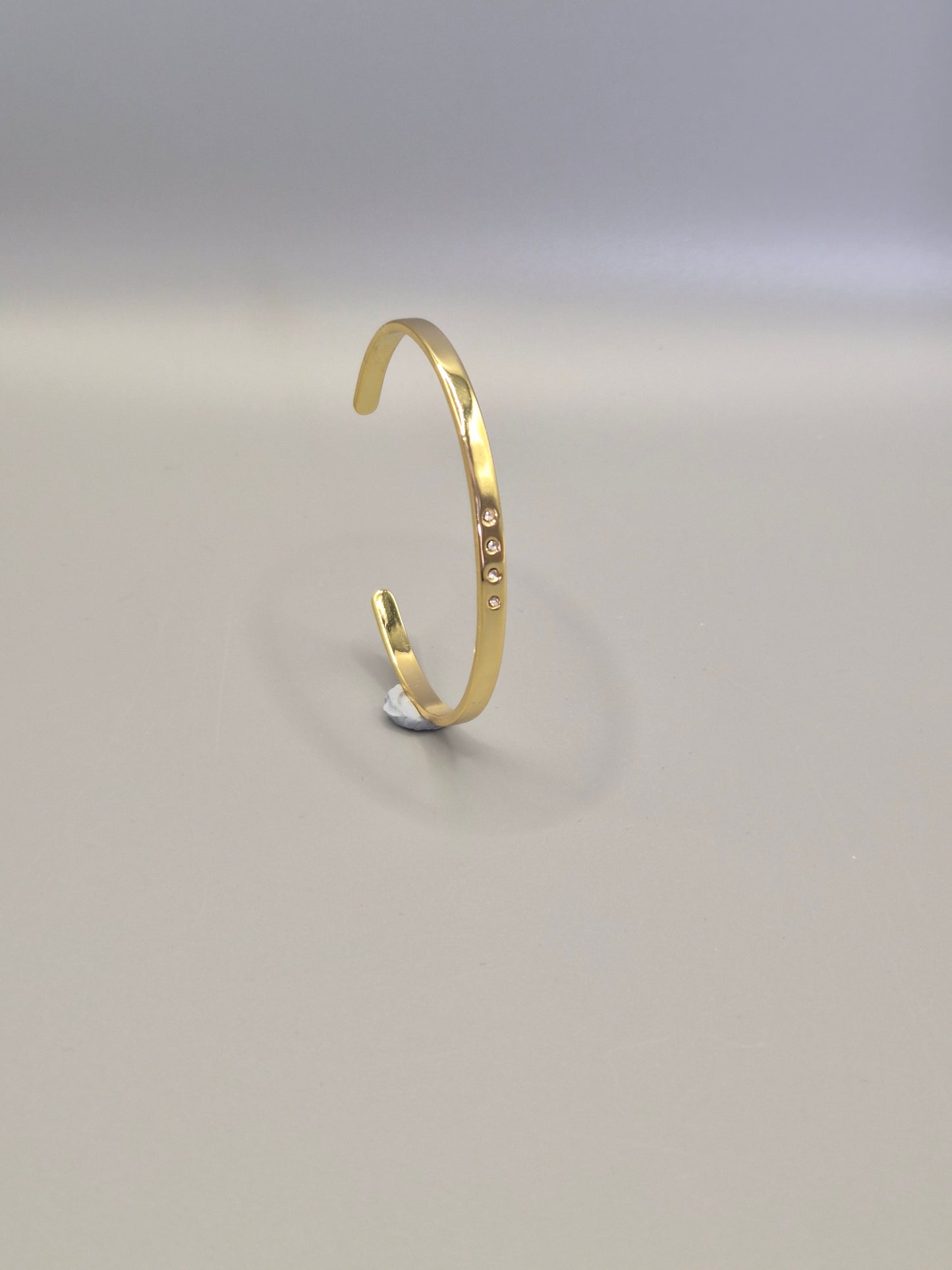 Torque Bangle With 4 Flush Set Cubic Zirconias - Yellow