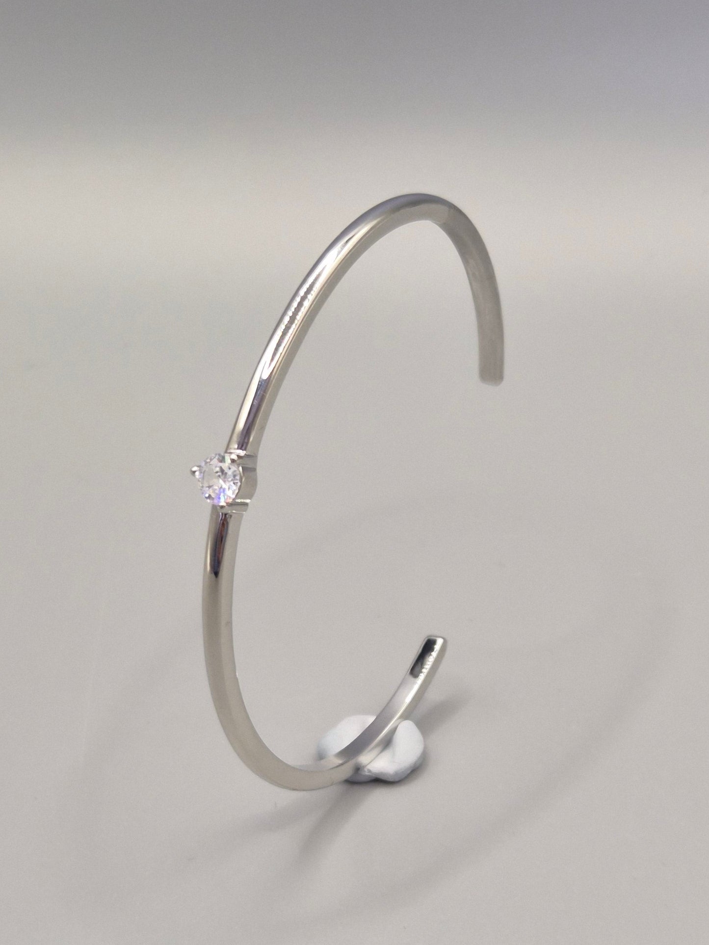 Torque Bangle Claw Set With Single Cubic Zirconia Centre Stone Silver Coloured