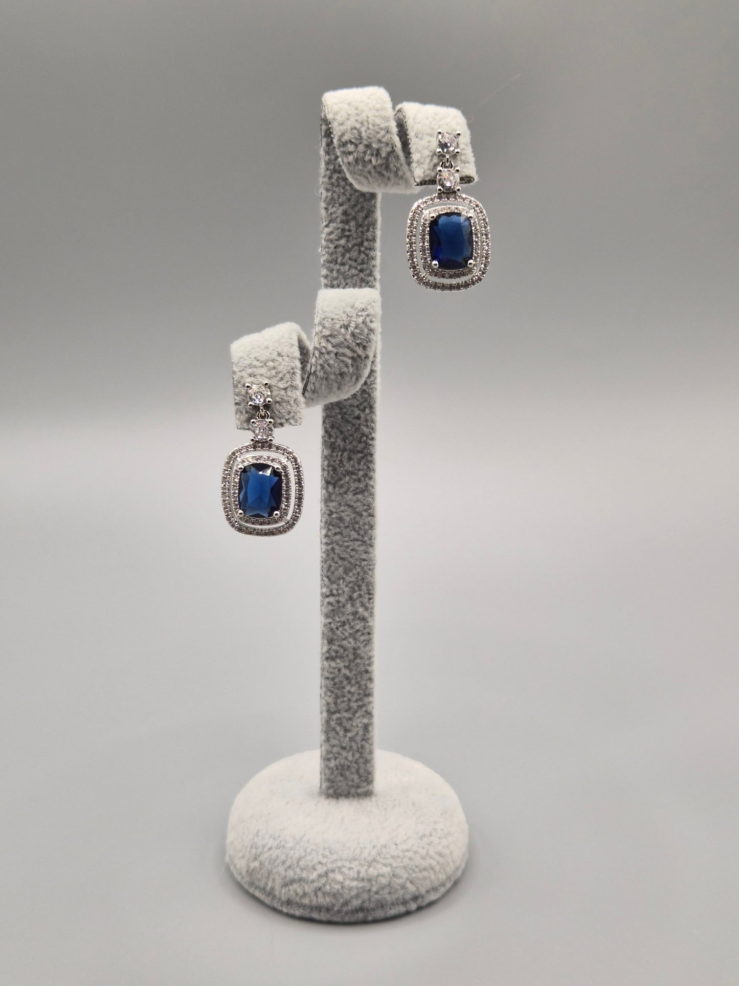 Blue Cushion Shaped Stone Surrounded by Cubic Zirconia Halo Drop Earrings